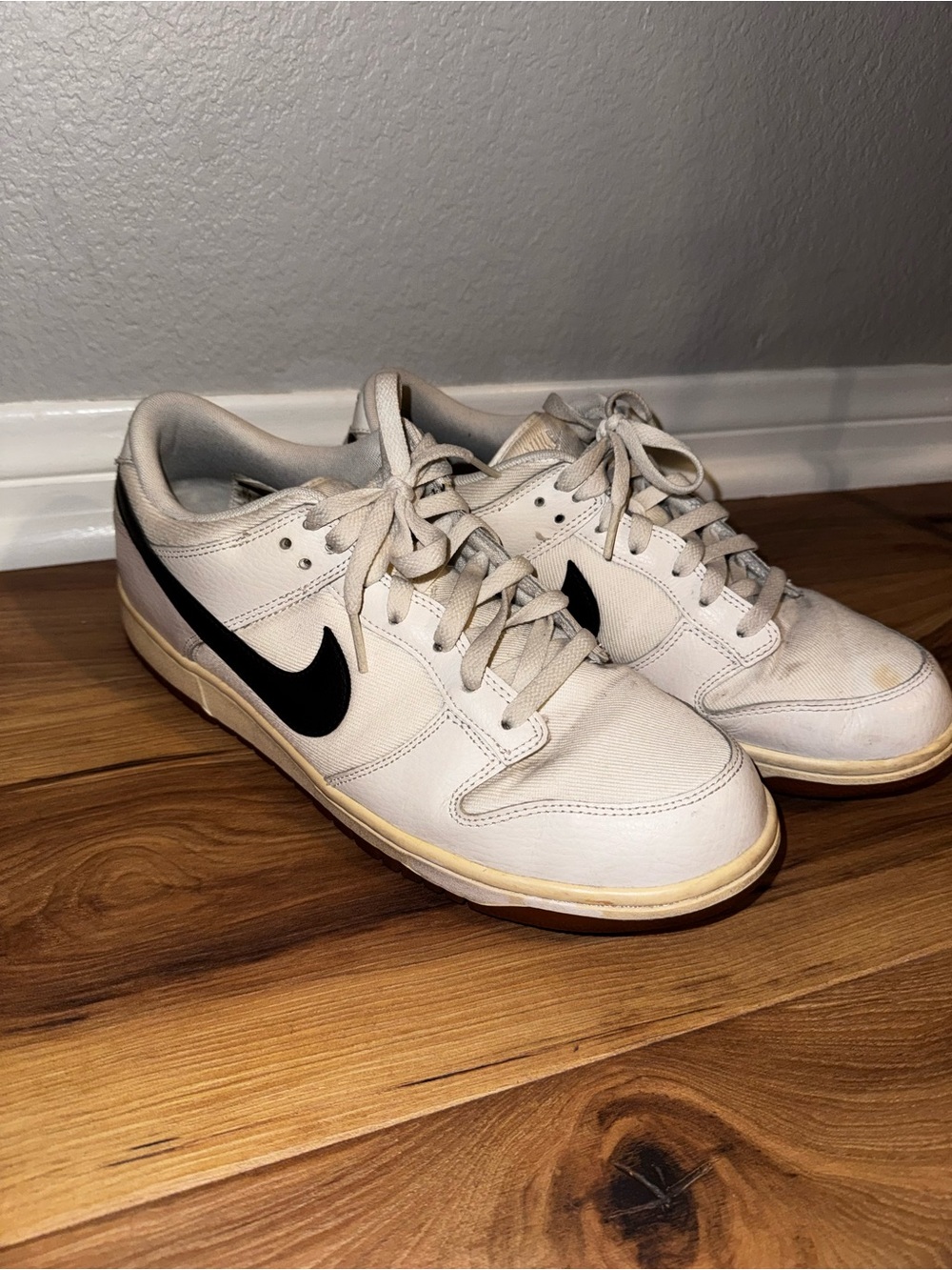 Nike Men's White Sneakers with Black Swoosh